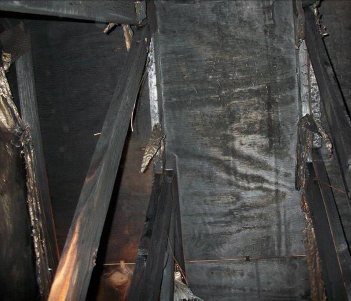 black soot attic from fire, trusses, and sheathing